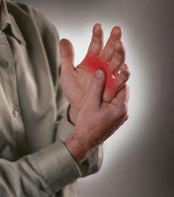 Man with arthritis receiving treatment from a chiropractor in Omaha